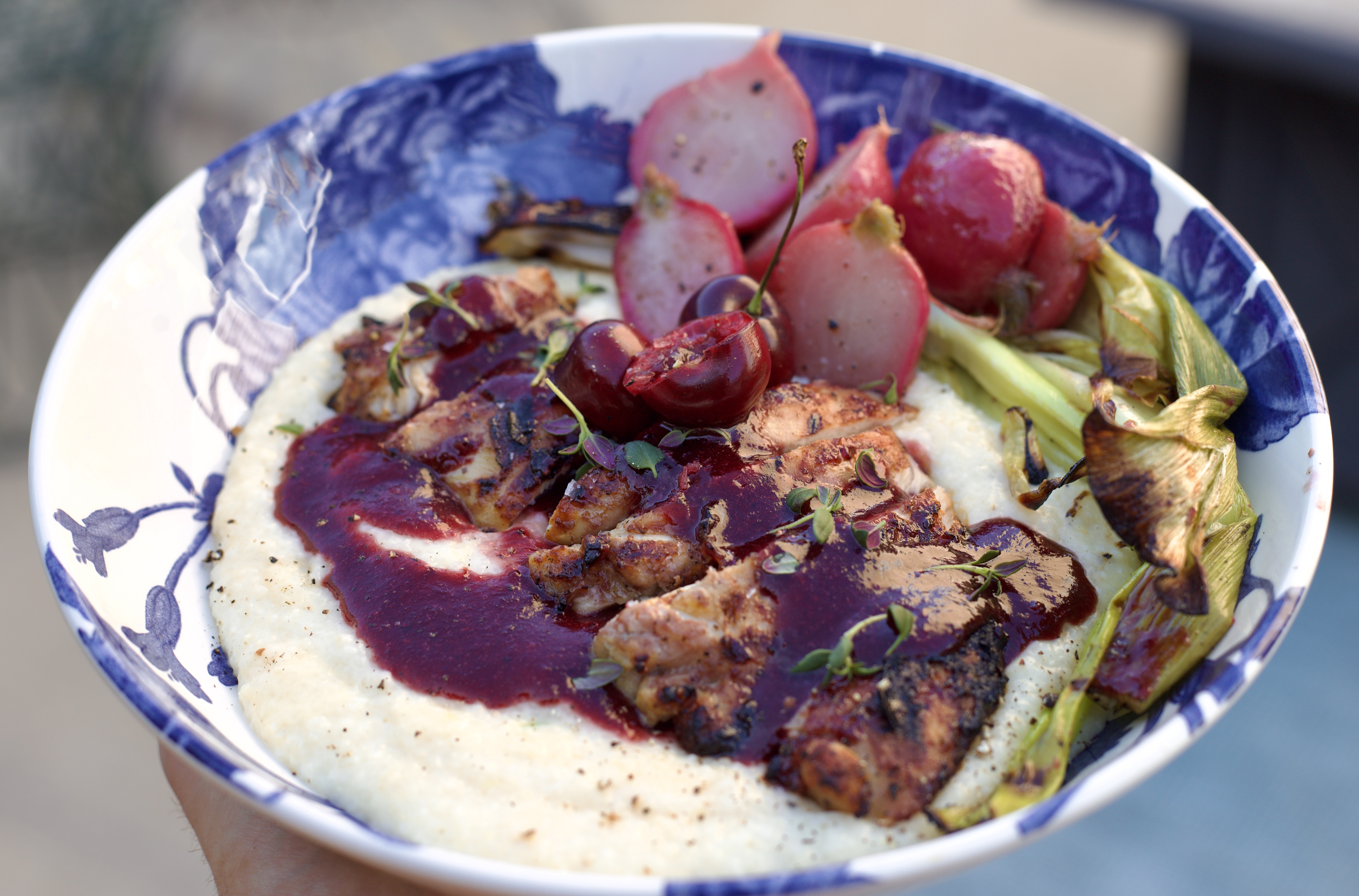 BBQ chicken with cherry balsamic glaze over cheddar polenta